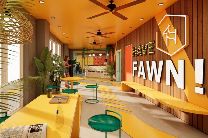「FAWN HOTEL」大廳以暖色調營造歡樂氛圍，設有洗衣房供入住旅客使用。　圖：小鹿文娛旅宿集團／提供
