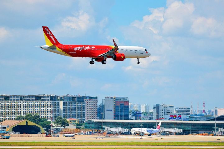 越捷航空全新空中巴士 A321neo ACF 客機降落於胡志明市新山一國際機場。　圖：越捷航空／提供